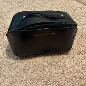 Black Cosmetic Bag with Gold Accents